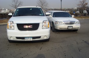 One White Excalibur and One 20 Passenger Super Stretch White Limousine (Hummer or Scalade)