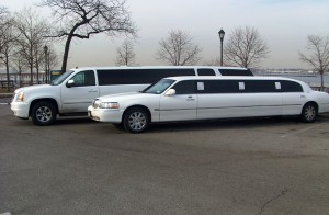 One 10 White Excalibur and One 10 Passenger White Limousine